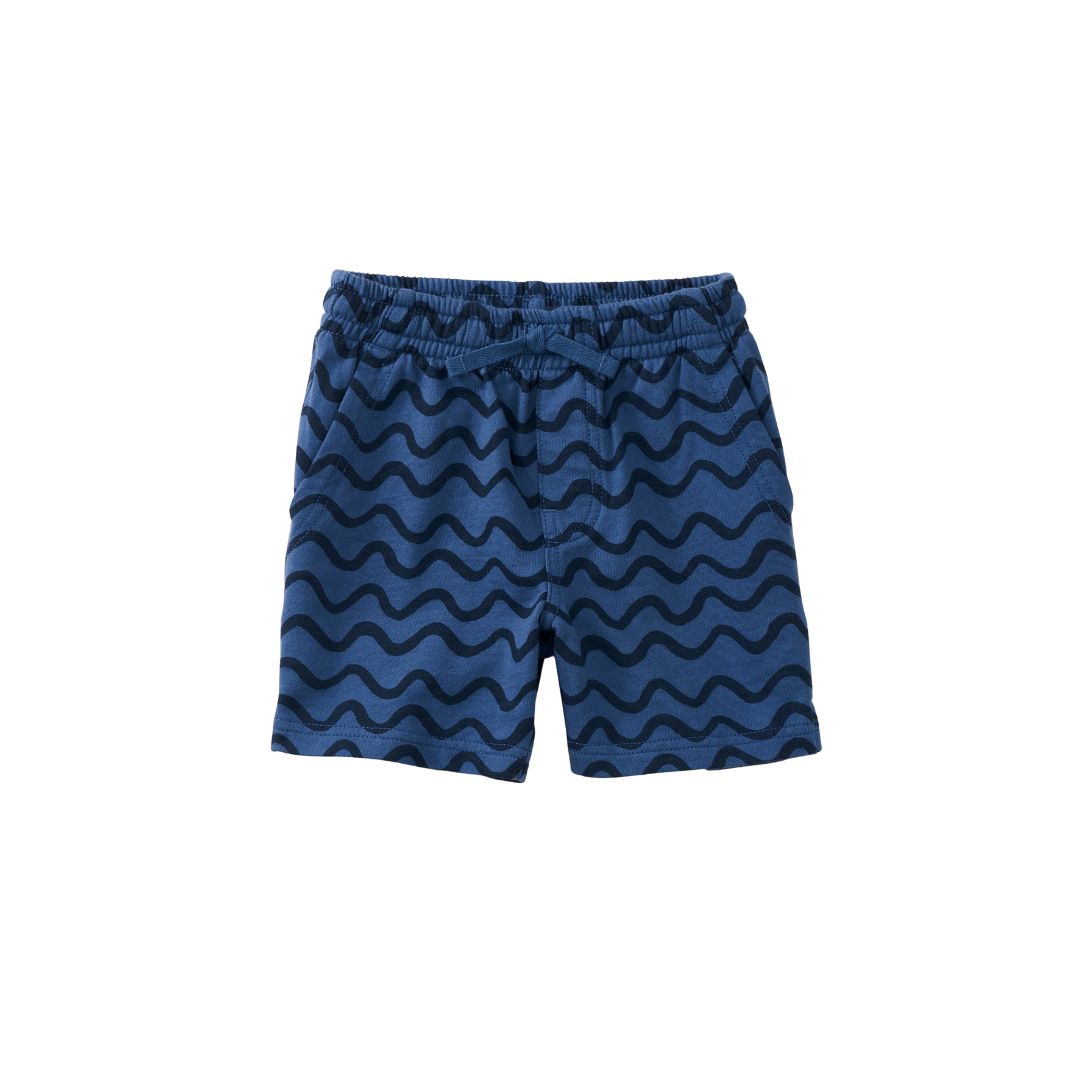 Waves in Blue Shorts